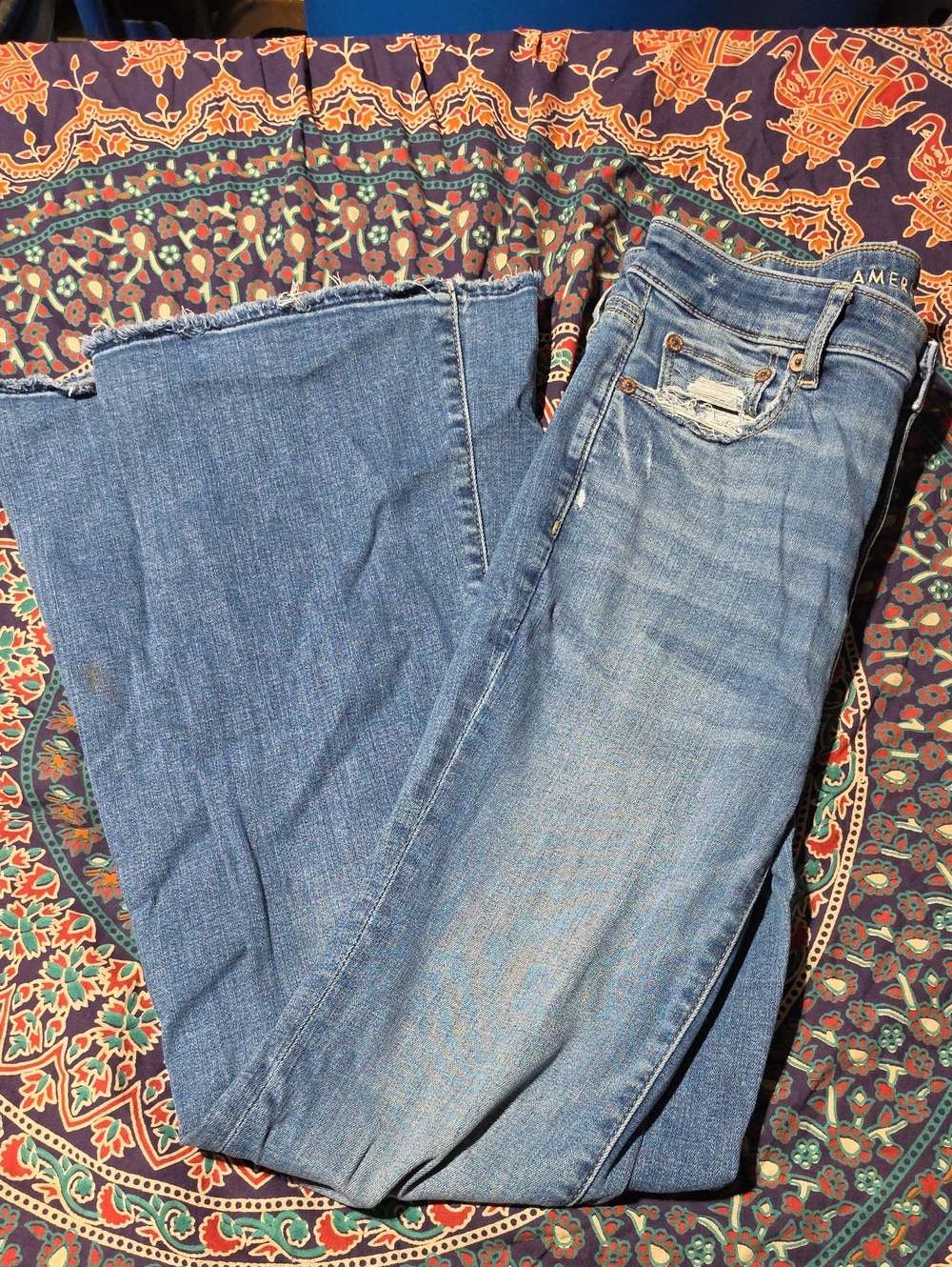 American Eagle Outfitters Light Blue Flared Jeans with Raw Hem